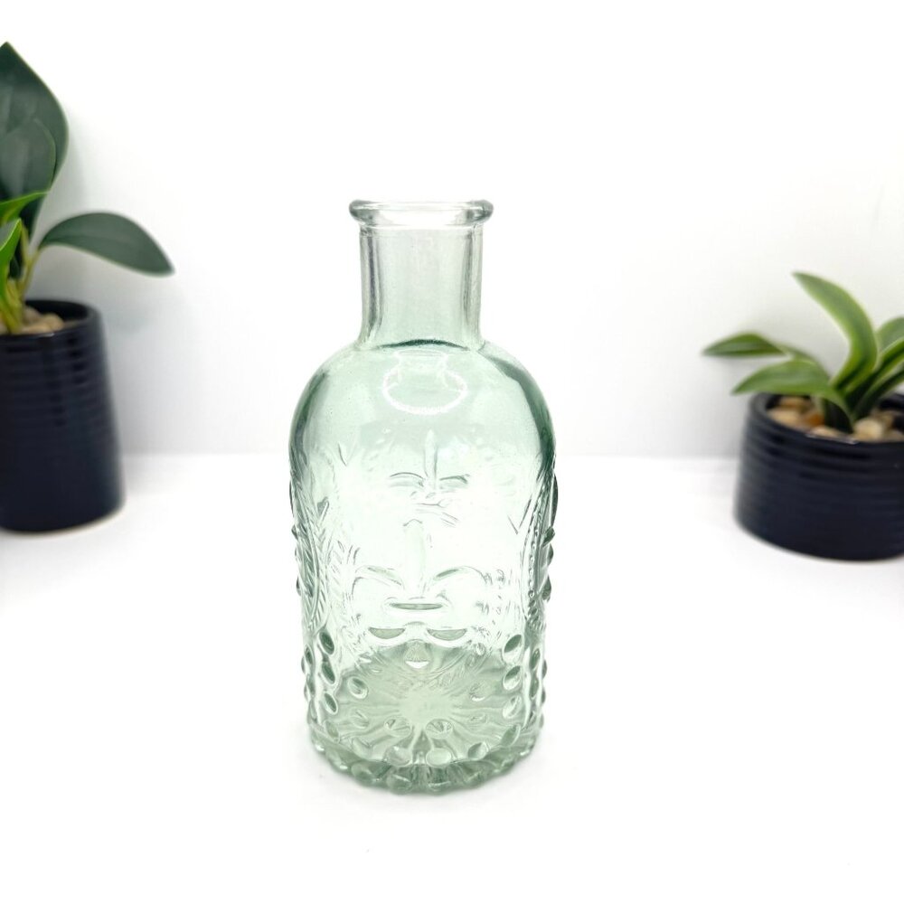 Embossed Light Green Glass Decorative Bottle With Fleur-De-Lis Pattern & Rounded